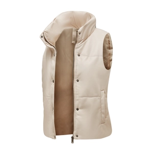 Close-up of beige faux leather vest showing matte texture, zipper, and button closure detail