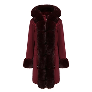 Detail view of burgundy parka featuring large faux fur collar and adjustable drawstring waist