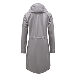 Detail of adjustable waist drawstring and waterproof fabric on the gray long trench coat
