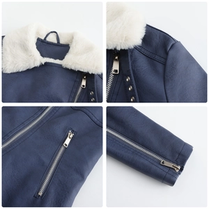 Détails de la veste de motard bleu marine avec col en fourrure et fermetures éclair argentées