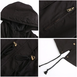 Detail view of cotton hooded jacket featuring vintage brass zippers and woven drawstrings