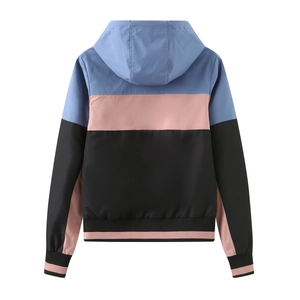 Back view of women's hooded color-block windbreaker with ribbed cuffs in blue and pink