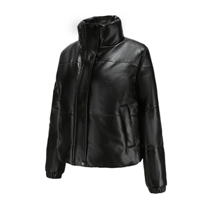 Detail of a women's black faux leather puffer jacket with a high stand collar and side pockets