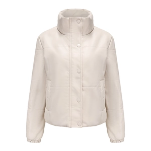 Detail of cream faux leather puffer jacket with stand collar and quilted texture