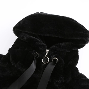 Detail of black faux fur hoodie with a metal ring zipper and adjustable drawstrings