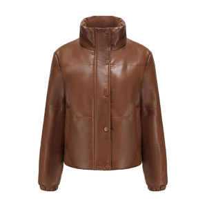 Detail of a brown quilted PU leather puffer jacket with high collar and snap buttons