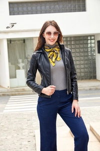 Close-up of black leather slim fit jacket with zipper closure and stand collar texture