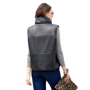 Women's black PU leather puffer vest with stand collar and quilted design, back view