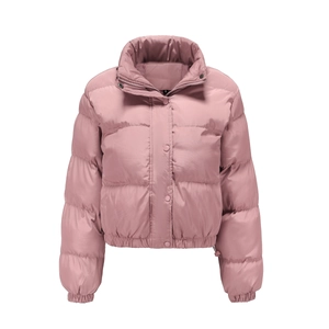 Detail view of pink short puffer jacket with high collar, zipper and snap buttons