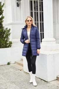 Navy blue water-resistant quilted parka for women featuring a detachable hood design