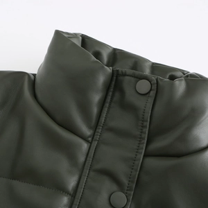 Detail of dark olive green PU leather puffer jacket with stand collar and matte buttons