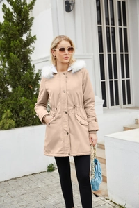Detail of hooded parka with white faux fur collar and adjustable drawstring waist