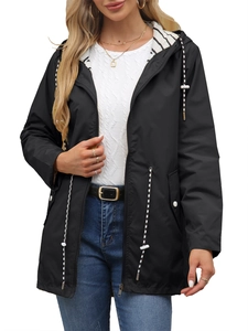 Detail view of water-resistant hooded raincoat with striped lining and adjustable drawstring