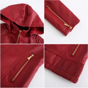 Detail of red leather jacket featuring a detachable hood and elastic pleated hem texture