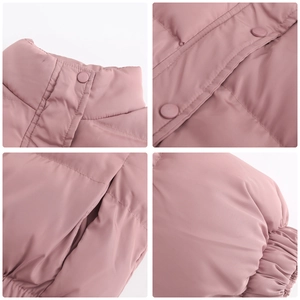 Detail view of pink quilted winter jacket featuring stand collar and button closures