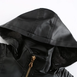Detail of a black hooded leather jacket showing gold zipper and soft fleece lining