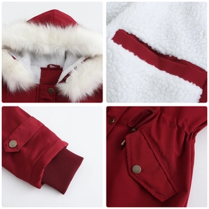 Detail view of red parka coat showing detachable faux fur hood and warm fleece lining