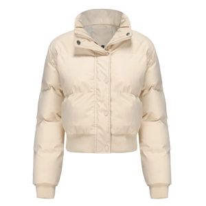 Detail view of beige padded jacket collar with S size label and zipper closure