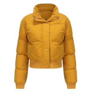 Detail of windproof ribbed cuffs and high stand collar on puffer jacket