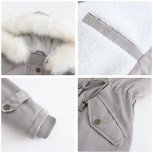 Detail view of gray parka showing detachable fur collar, fleece lining, and ribbed windproof cuffs