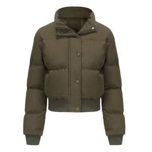 Detail of olive green quilted puffer jacket with stand collar and rib-knit cuffs