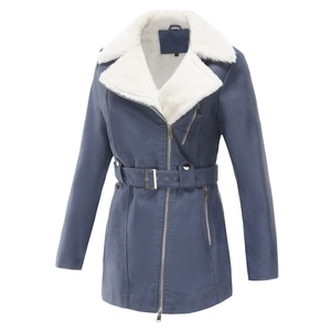 Detail view of the blue faux leather jacket with plush white faux fur collar and waist belt