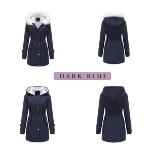 Detail view of dark blue hooded parka featuring a detachable faux fur collar and warm lining