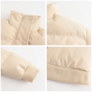 Detailed views of beige puffer jacket showing snap-button collar, cuffs and ribbed hemline