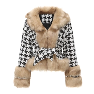 Detail ofhoundstooth coat with faux fur collar and quilted lining texture
