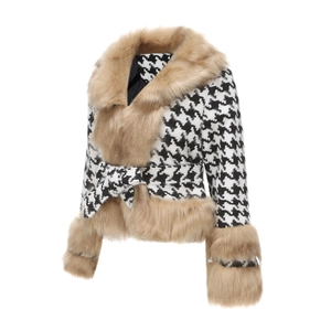 Detailed view of houndstooth jacket with faux fur trim on collar and cuffs with waist belt