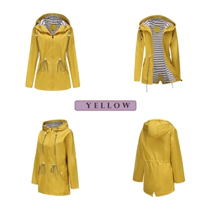 Detail view of yellow waterproof raincoat showing striped lining and drawstring hood