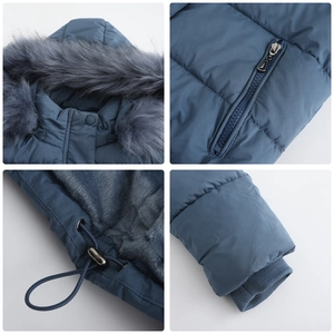 Detail view of winter coat featuring faux fur hood, fleece lining, and ribbed cuffs