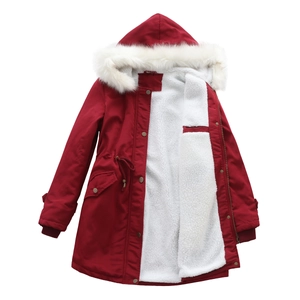 Detail of red winter parka featuring detachable white faux fur collar and warm fleece lining