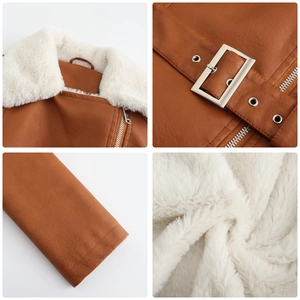 Detail of vintage brown faux leather jacket showing plush white faux fur lining and buckle