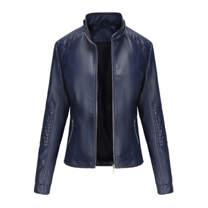 Detail of navy blue faux leather jacket showing diamond-quilted shoulders and metal zipper