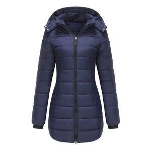 Detail view of water-resistant navy blue quilted jacket with hood and high collar zip