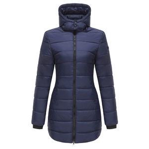 Close-up of windproof ribbed cuffs and neck buckle on women's navy quilted parka