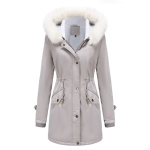 Detail of light gray hooded parka with thick white faux fur collar and drawstring waist