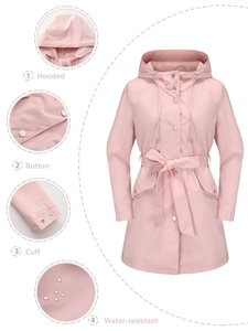 Water-resistant pink hooded trench coat detail showing waist belt and button closure