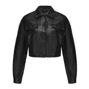 Detail of black faux leather cropped jacket showing lapels and buttoned chest pockets