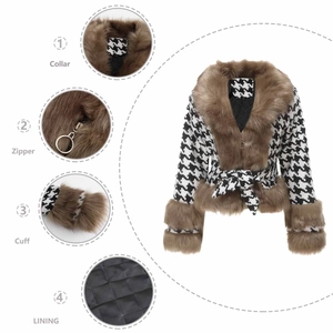 Detail view of houndstooth jacket featuring a faux fur collar and quilted warm lining