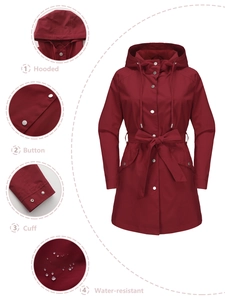 Detail showing water-resistant fabric and adjustable cuffs on a hooded wine red coat