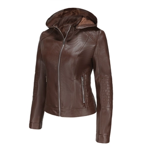 Detail showing side pleated texture and metal zipper pockets of the brown leather jacket