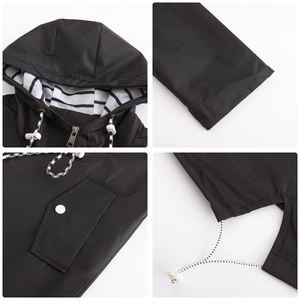 Details of women's hooded raincoat featuring striped lining and waterproof fabric textures.