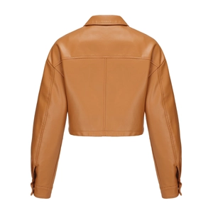Rear view of cropped tan faux leather jacket showing detailed back stitching and snap cuffs