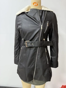 Detail of a women's black faux leather biker jacket with faux fur collar and waist belt