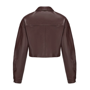Back view of a cropped chocolate brown faux leather jacket with drop shoulder detail