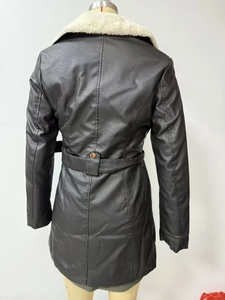 Rear view of black PU leather coat with white shearling collar and belted waist detail