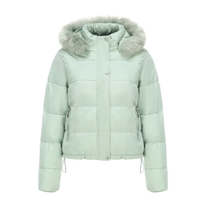 Detail of mint green quilted jacket featuring a fluffy faux fur trim hood and windproof collar