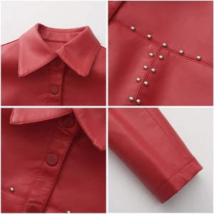 Detailed close-up of red PU leather jacket with metal rivets and matching buttons
